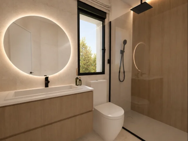Modern bathroom with walk-in shower and backlit round mirror, Residencial Montesol